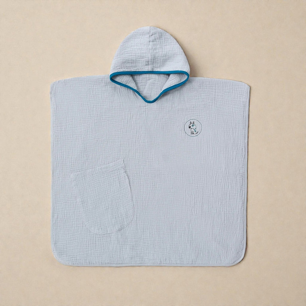 Cape de bain enfant en mousseline bleu clair